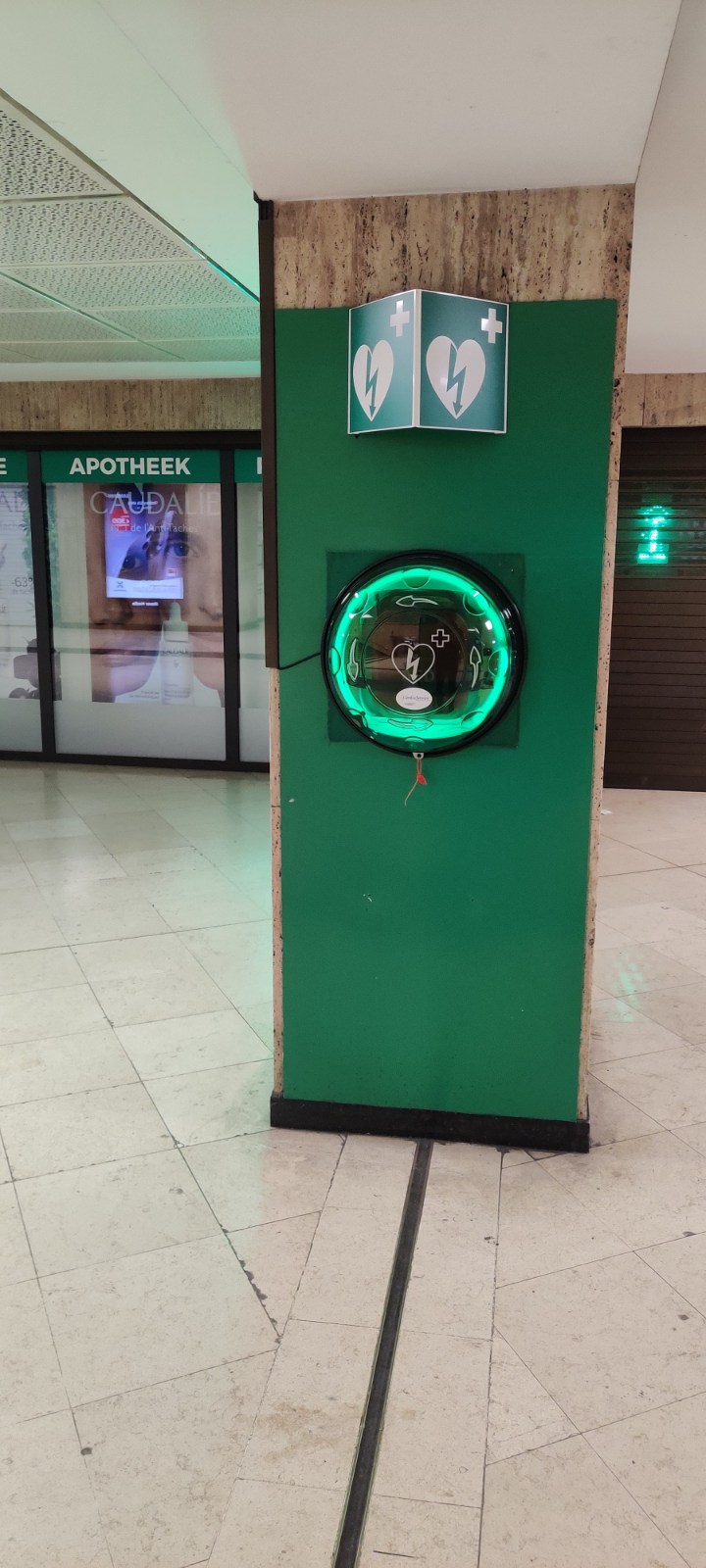 AED Down the large stairs in the main hall, then directly to the left